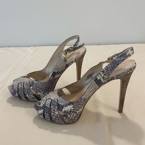 Guess snakeskin heels. Very good condition.